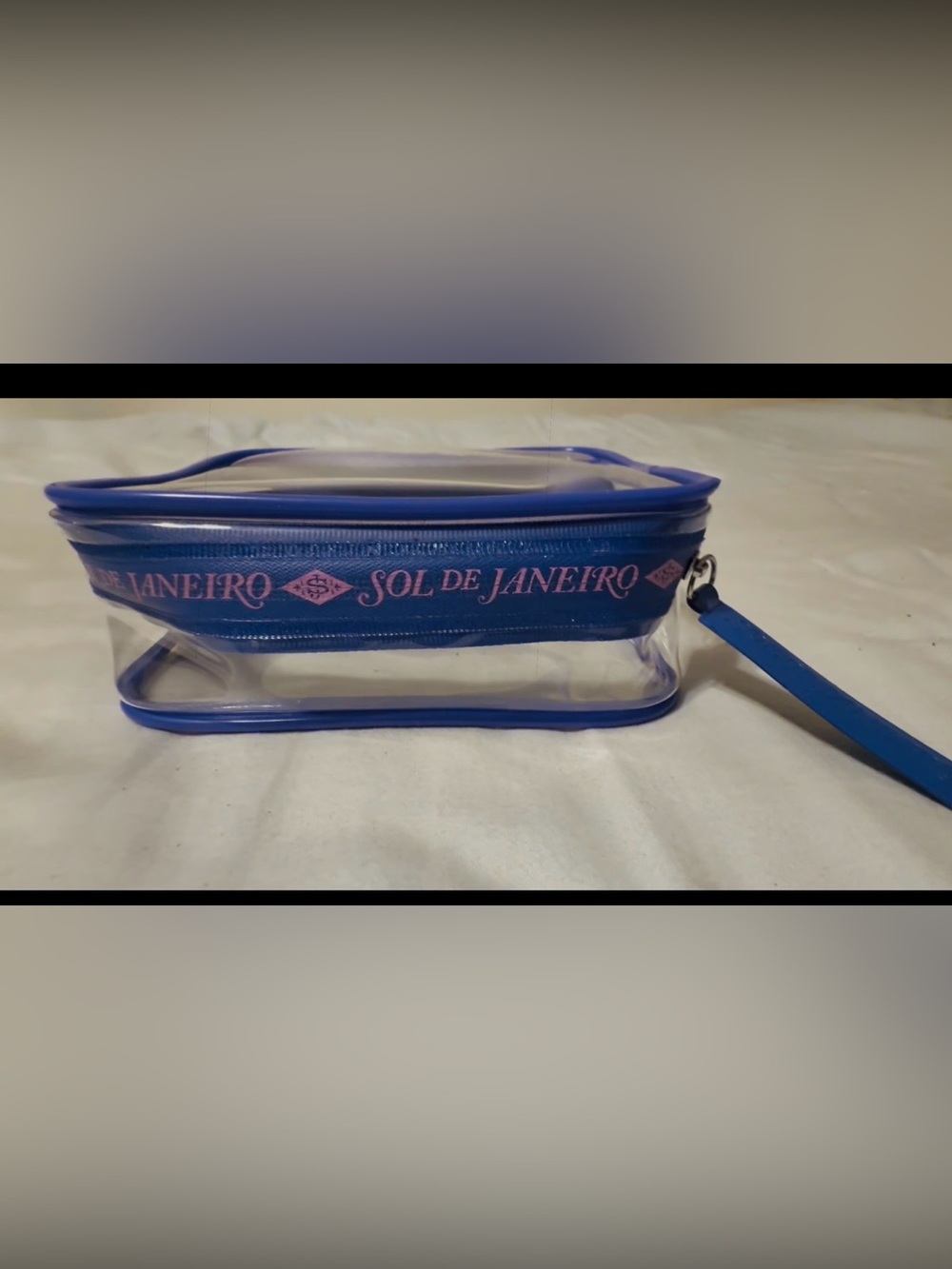 Sol de Janeiro Clear Cosmetic Pouch in Violet, lightly used.
